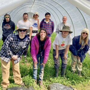AFLO_1 Grower in a greenhouse