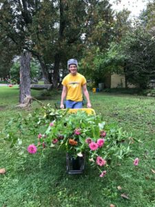 High Spirit Community Farm man with wheelbarrow