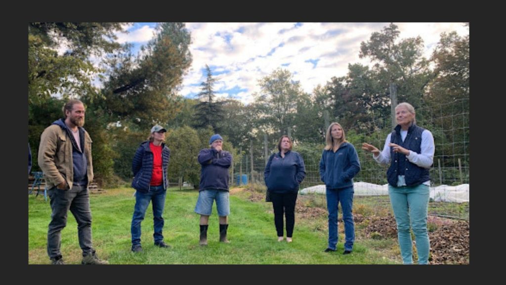 Group standing in field